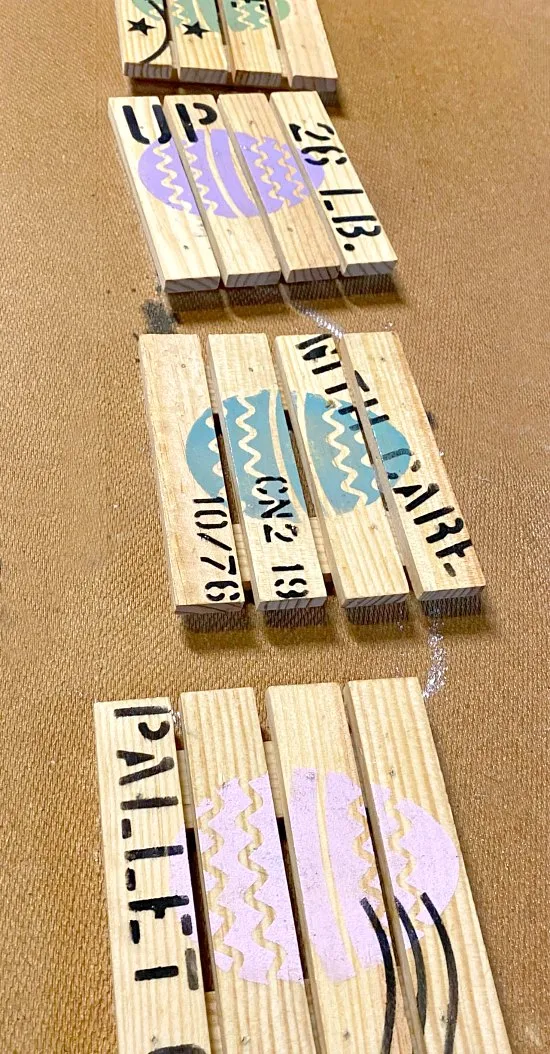 Row of coasters with stencils