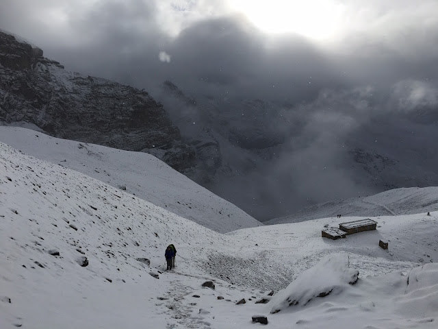 Two people climbing Mount Everest