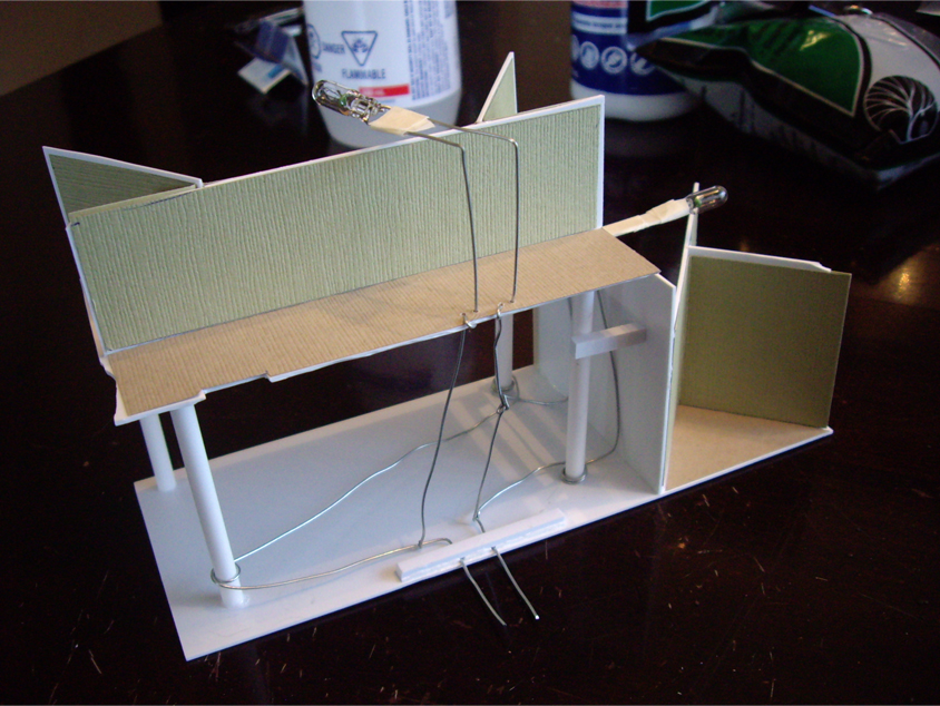 Scratch built removable interior showing a light bulb and electrical wiring for a DPM Cutting Scissor’s Co. kit