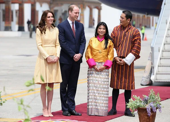 Prince William, Duke of Cambridge and Catherine, Duchess of Cambridge arrive into Paro International Airport for the first day of a two day visit to Bhutan. Kate wore Emilia Wickstead soft-yellow gold bespoke coatdress