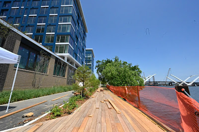 New apartment buildings in Washington DC include the Watermark, Douglas Development's building with views of the Frederick Douglass Memorial Bridge to Anacostia