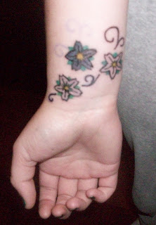 Cool Japanese Cherry Blossom Tattoo On Wrist Picture 8