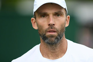 Karlovic wins Wimbledon opener at 40