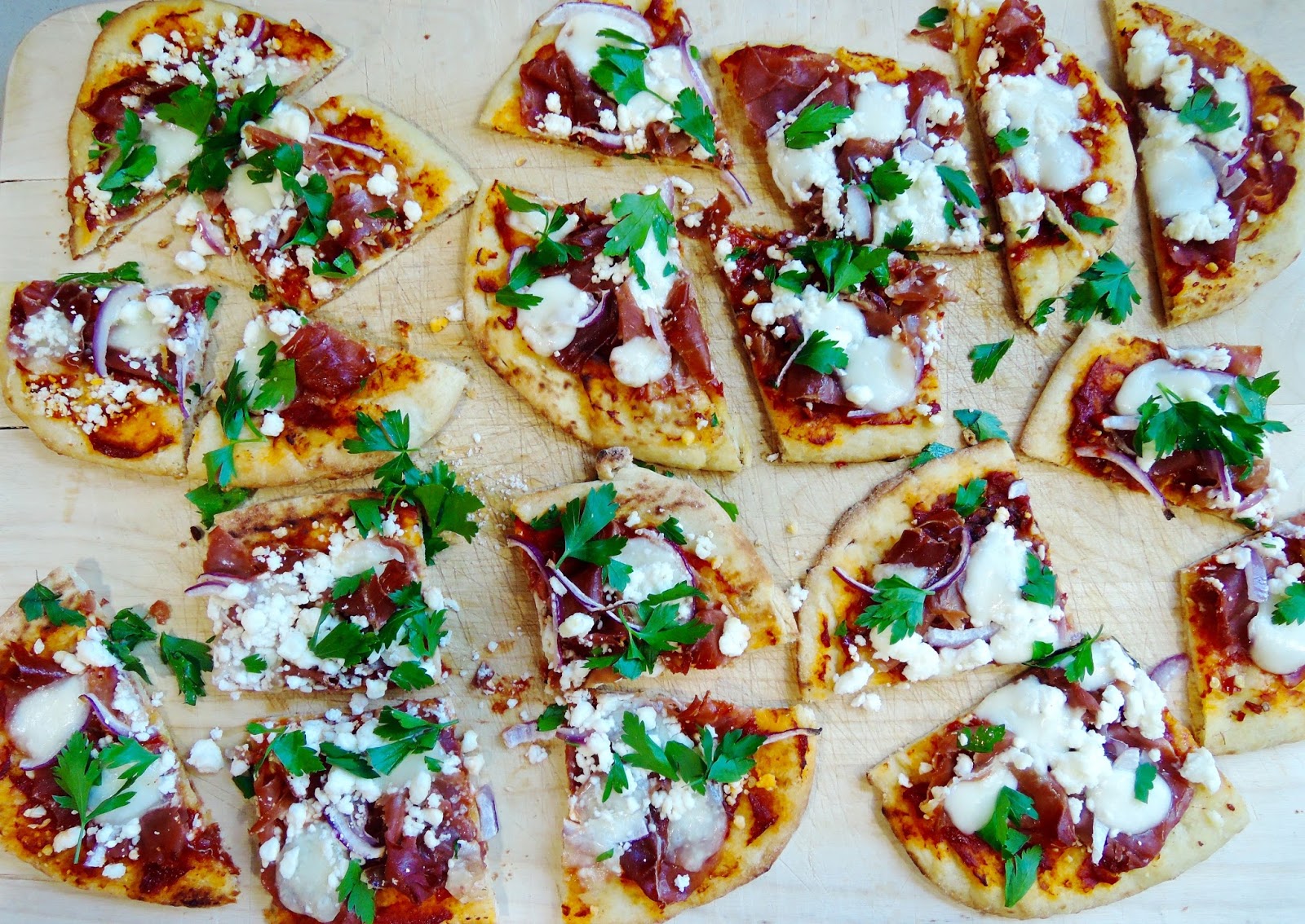 The Briny Lemon Prosciutto Pizza with Goat Cheese and Fresh Mozzarella