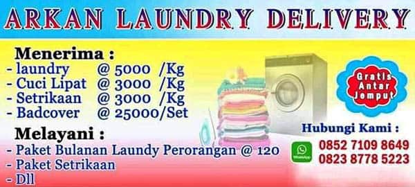 contoh desain spanduk laundry