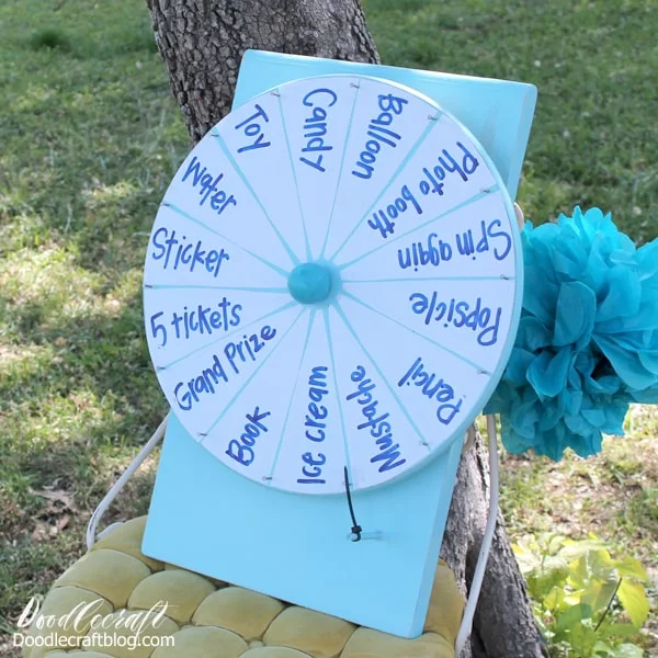 How to Make a DIY Spinner Prize Wheel! This simple DIY craft making a Spinner Prize Wheel will make you a Rockstar! Don't you just love spinning a prize wheel and hoping you land on the jackpot prize at the fair or other event?     They are so much fun. I thought they would be fun for backyard parties, trunk-or-treats, events and even chores--so I invented this DIY version that you can make for all your events!