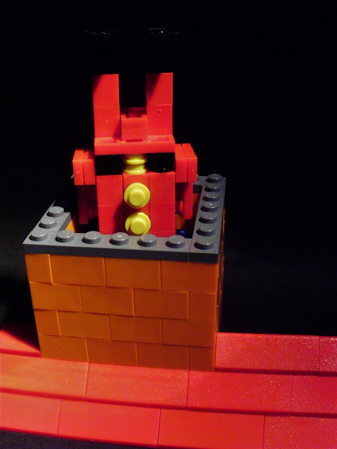 MOC LEGO Pai Natal desce pela chaminé