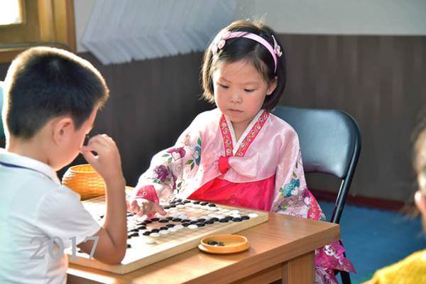 Nursery Children Playing Paduk