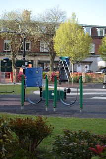 A childrens play area outside the shops