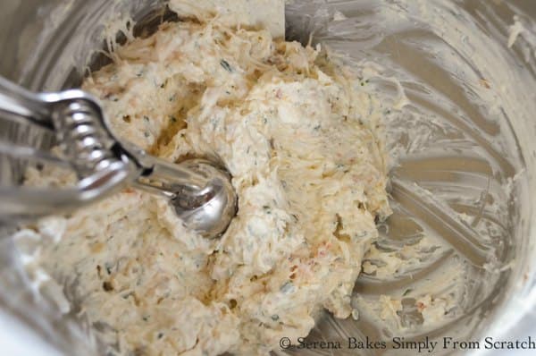 Fold in Lump Crab Meat to Cream Cheese Sour Cream Herb Mixture for Crab Stuffed Mushrooms.