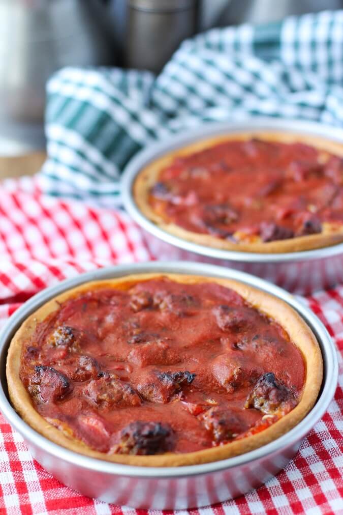Individual Deep Dish Pizzas with peppers and sausage