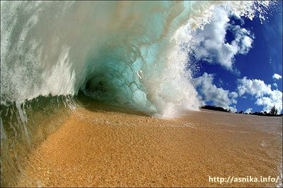 "waves", "water and sand", "waves separating the land" 