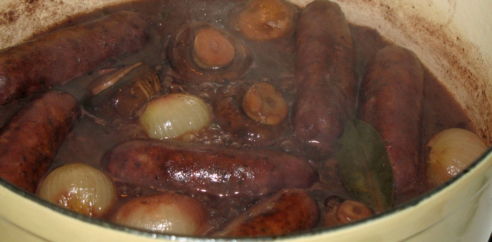 The Happy Housewife Sausages braised in red wine with Colcannon mash