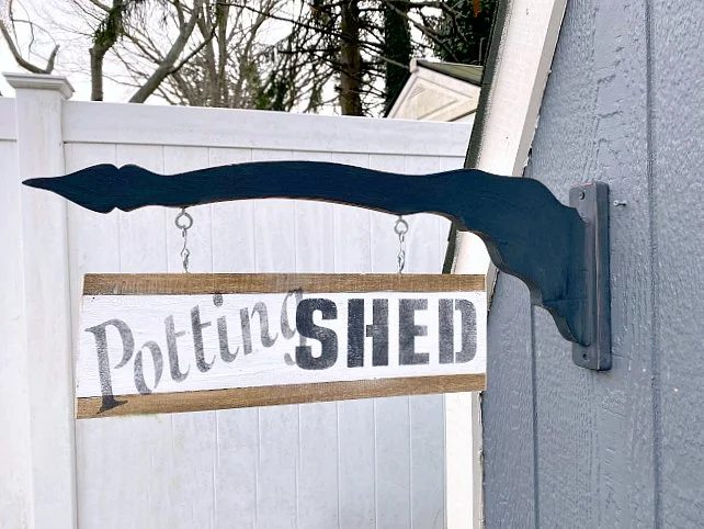 Two sided garden shed sign