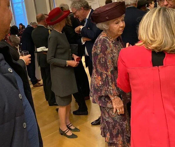 Princess Beatrix attended a symposium held on the occasion of Kingdom Day at the Council of State in The Hague