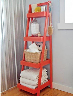 You can use old wooden ladder to organize your cosmetics, toilet paper and towels
