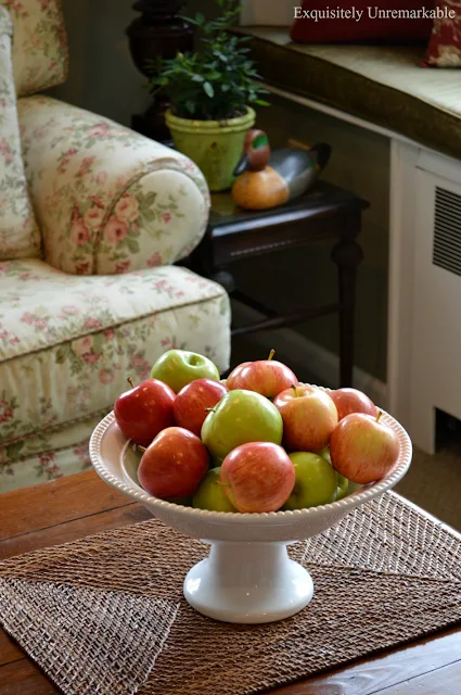 Apples in a bowl on a small coffee table