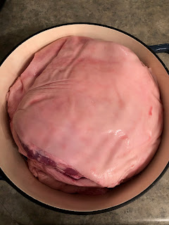 whole pork shoulder in pan