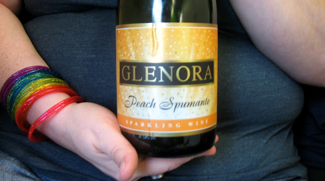 She held this bottle of Peach Spumante for me before we drank it :)