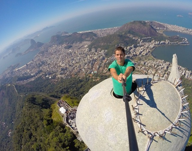Reckless check-in on top of Christ the Redeemer statue