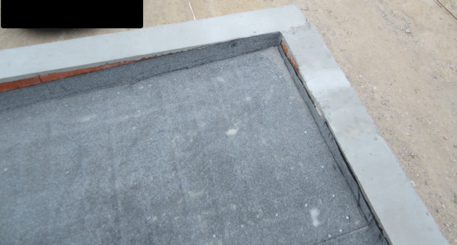 Unser Hausbau: Garage in Eigenleistung: Zumörteln der Umrandung