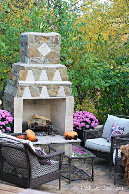 Outdoor fireplace on paver patio