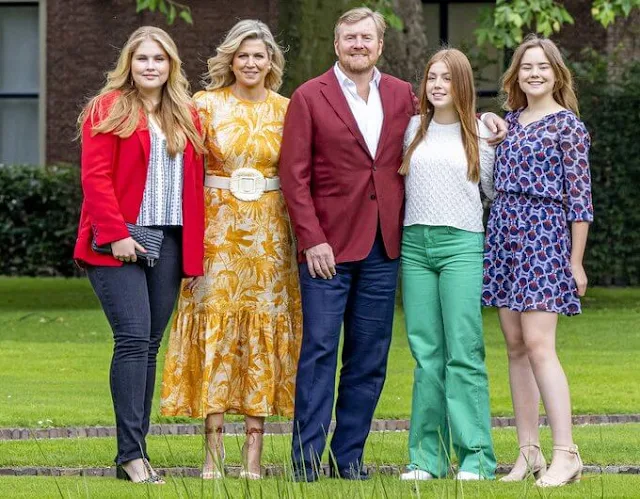 Queen Maxima wore a belted ruffled printed midi dress by Zimmermann, Amalia wore a new single breasted crepe blazer by Tommy Hilfiger