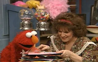 Elmo and Ruthie appear on the scene they look Elmo's drawings and talk about them. Sesame Street The Best of Elmo
