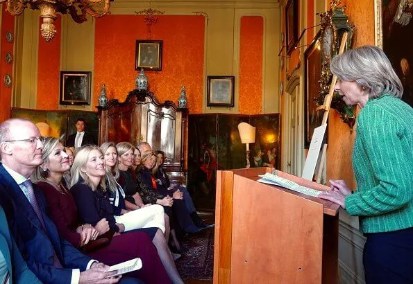 Queen Maxima visited Museum Van Loon, and VU University. The Queen wore a burgundy sweater and pants by Natan