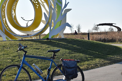 Bike by art along Lowe Park Trail.