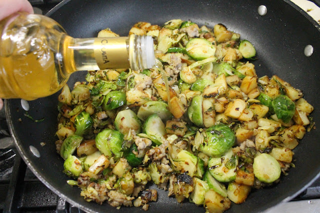 Food Lust People Love: If you are looking for a wonderful, flavorful side dish for the holidays, try my Brussels sprouts and potatoes with sausage crumbles, that is, a lovely mix of aromatics fried with sausage until crispy and golden.