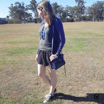 awayfromtheblue Instagram | black pull on printed shorts outfit with grey tee purple cardigan and navy accessories converse