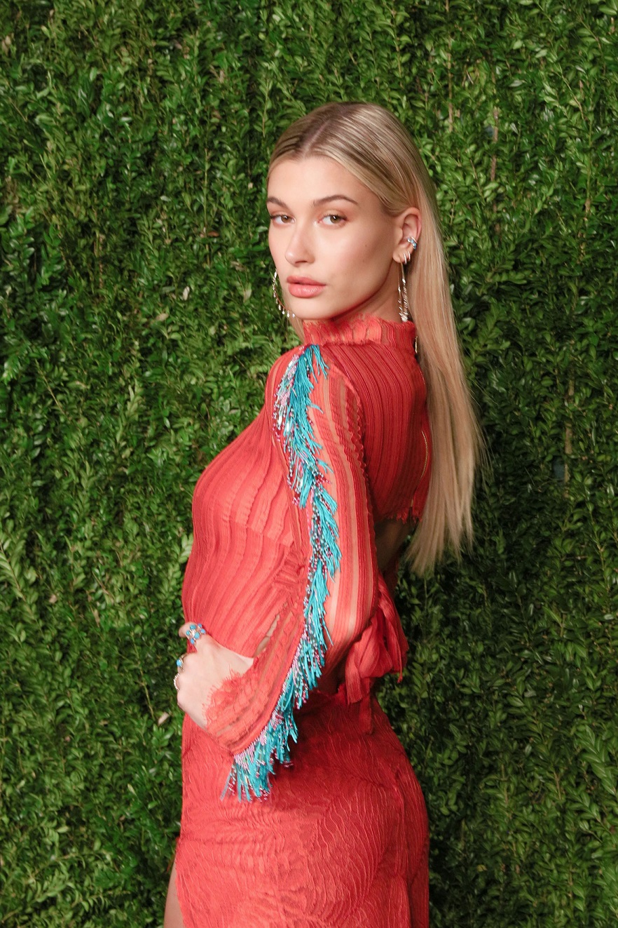 Hailey Baldwin wears thigh flashing dress to the 13th Annual CFDA Vogue