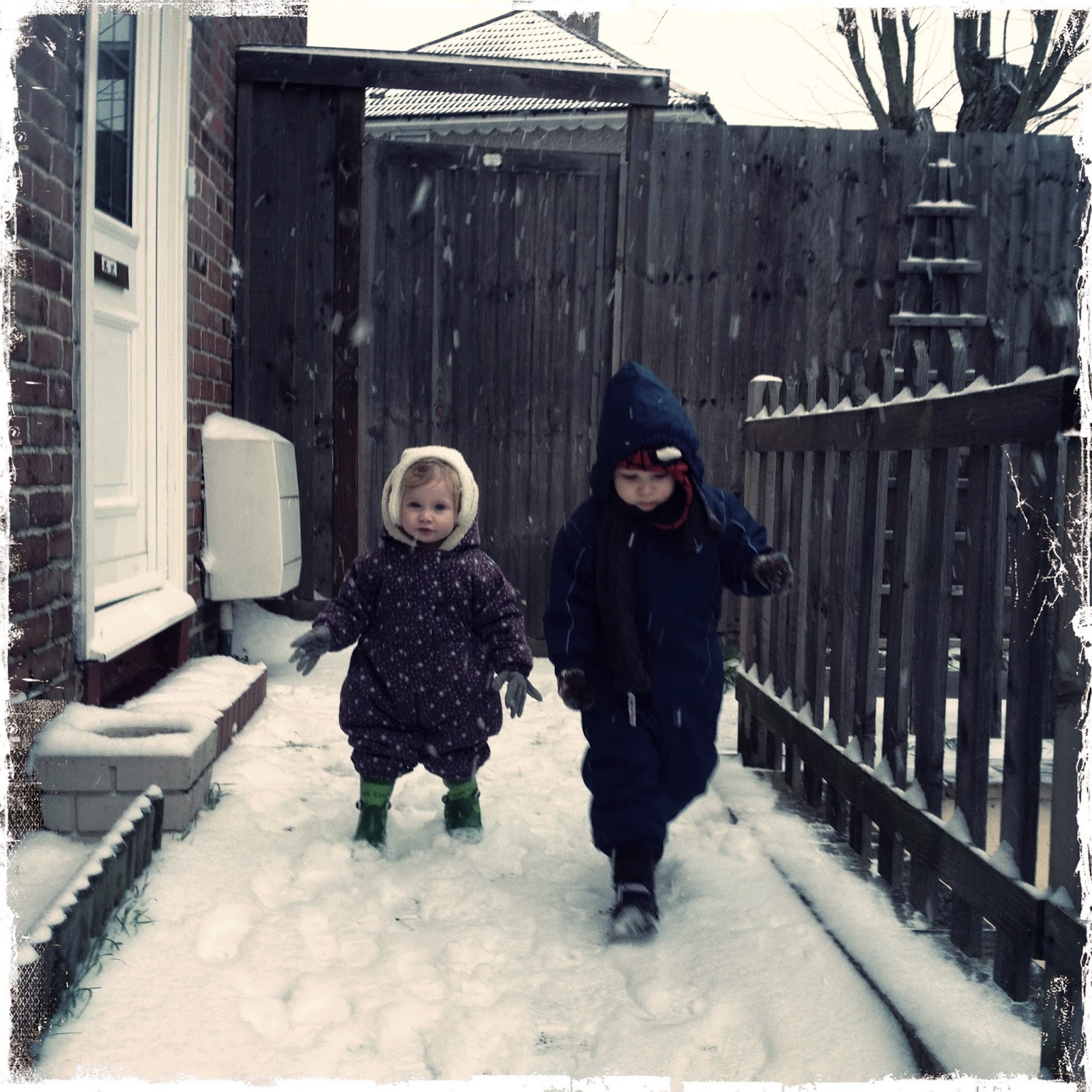 Blake Clement 3 and Maegan 1 Clement playing in the snow - Jan 2013