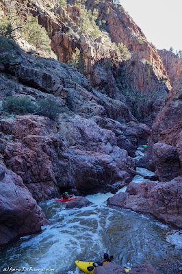 Austin Woody and Tom Herring eyeing up another marginal line in Hell's Gate, kayak canyon whitewater red rocks beautiful dificult slot WhereIsBaer.com Chris Baer