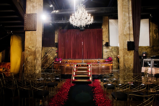 The ceremony decor was kept simple yet striking with a lush red rose petal 