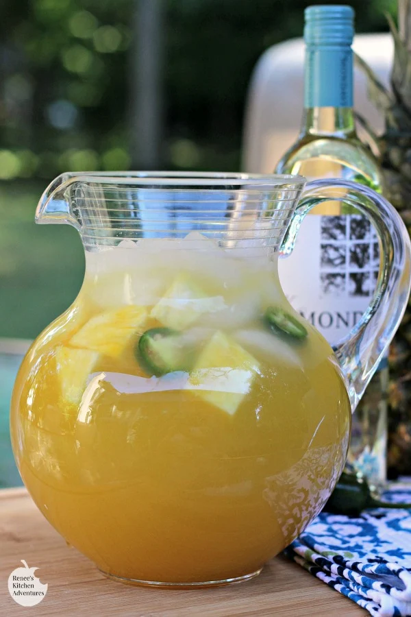 Pineapple-Jalapeno Wine Spritzer | by Renee's Kitchen Adventures is an easy recipe for an adult beverage cocktail made with wine, pineapple juice and jalapeno infused simple syrup. #RKArecipes #pineapple #beverage