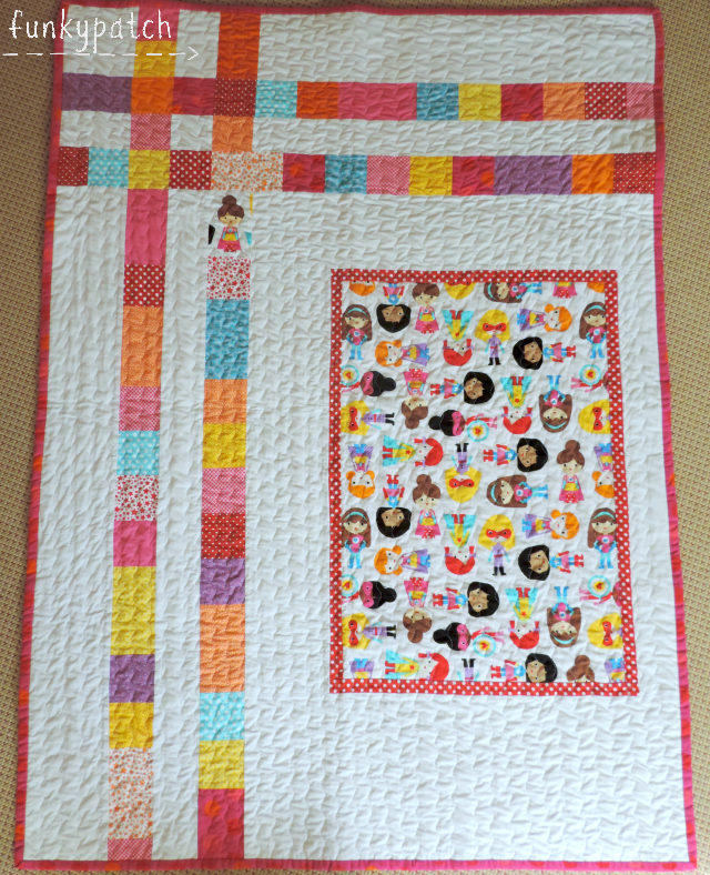 Colcha de patchwork para cuna con Súper Heroínas