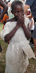 Girl in Uganda~upon hearing she is about to receive a new dress!