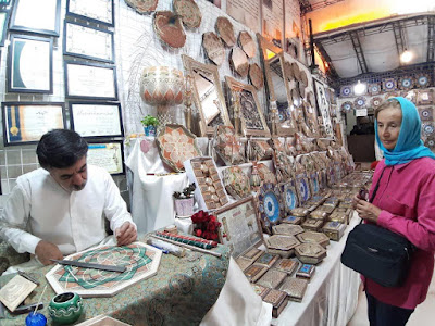 You can visit Qeytariye bazar in Isfahan and spend some hours in this historical yet alive atmosphere which seems to be a great experience while traveling in Iran and enjoy watching and buying these marvelous inlaid art crafts consist of objects with small wooden triangles in regular geometric forms.    