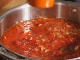 add-garlic-onion-in-the-tomato-paste