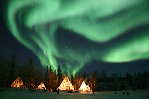 Northern Lights Over Teepees,  NORTHERN LIGHTS, YELLOW KNIFE. CANADA