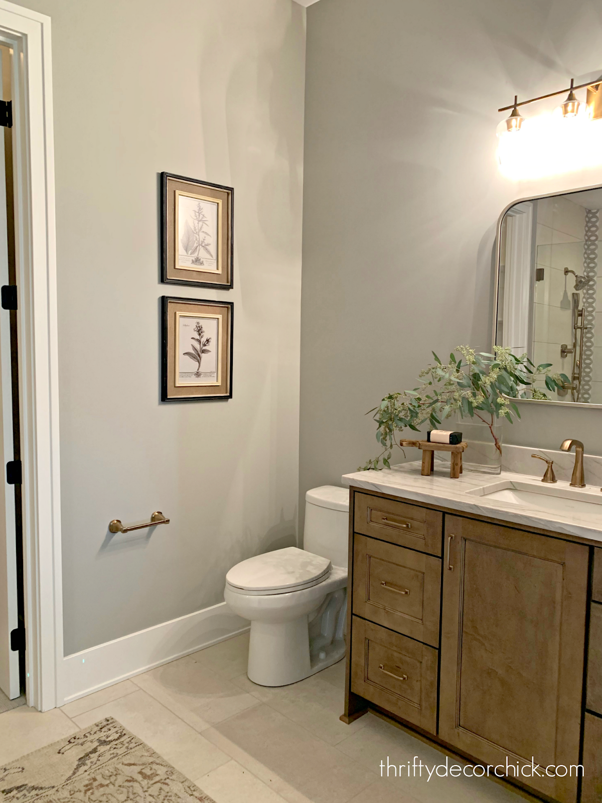 light gray walls light wood vanity 