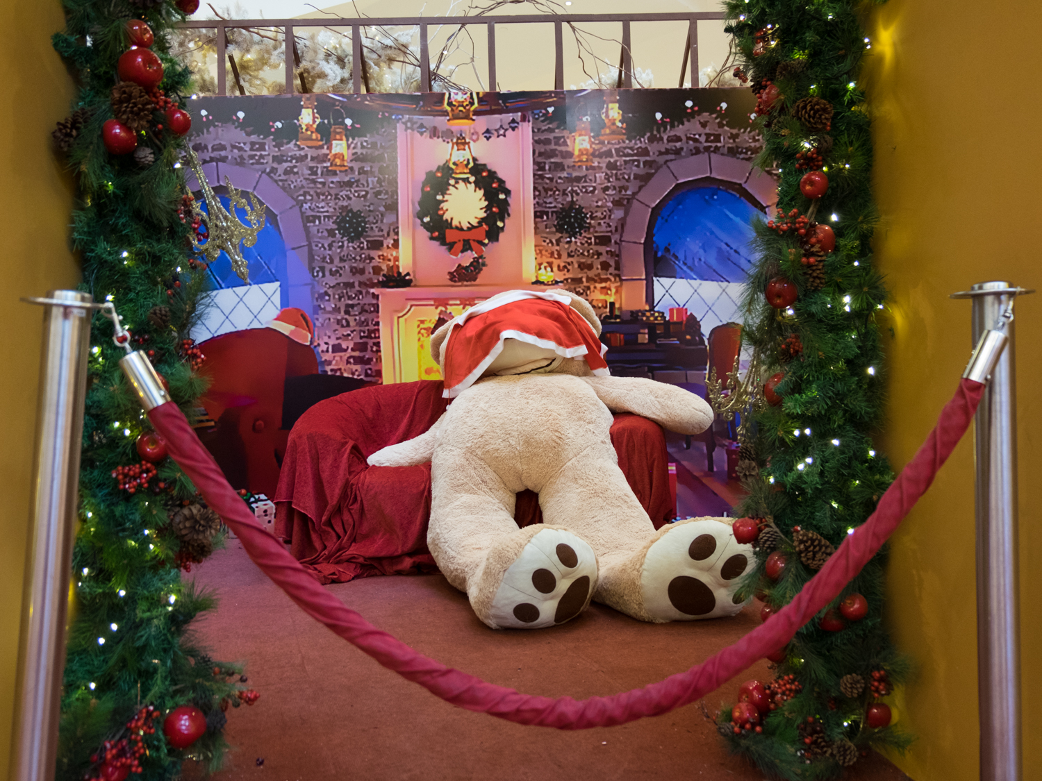 a giant bear collapsed behind ropes taking a break from hours of posing with kids its so hard to be an inanimate object - Giant Christmas Hours a giant bear collapsed behind ropes taking a break from hours of posing with kids its so hard to be an inanimate object - Giant Christmas Hours