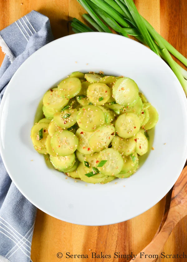 Asian Cucumber Salad is spicy sweet in a toasted sesame seed oil dressing with just a hint of honey is a delicious side dish recipe from Serena Bakes Simply From Scratch.