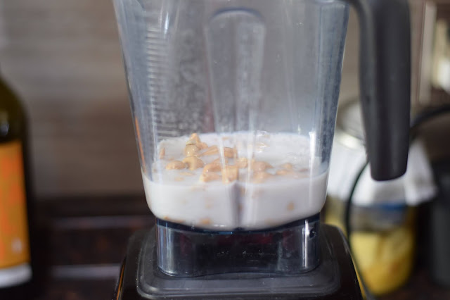 Almond milk in the blender with the cashews