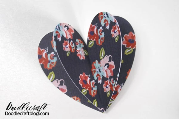 Make a heart shape pop up card for Valentine's day with 3 patterned paper hearts