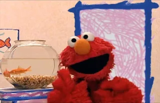 Elmo shows his hands. Sesame Street Elmo's World Hands