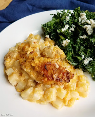 Cheesy potatoes with a ranch twist and topped with buffalo chicken, bacon, more cheese and plenty of buttery corn flakes. What's not to love? buffalo chicken casserole served with kale salad