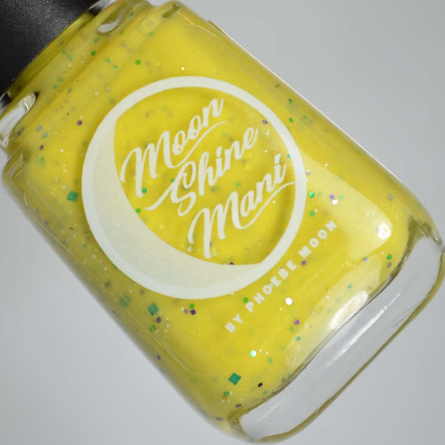 yellow glitter nail polish in a bottle